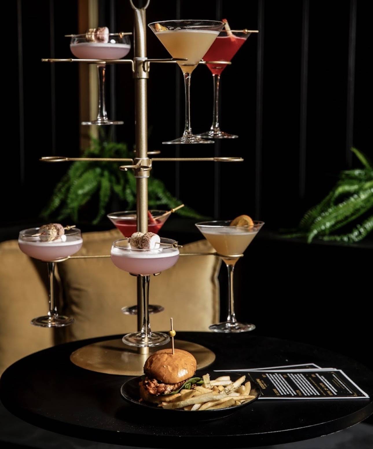 Illumina cocktail tree served with a burger and fries